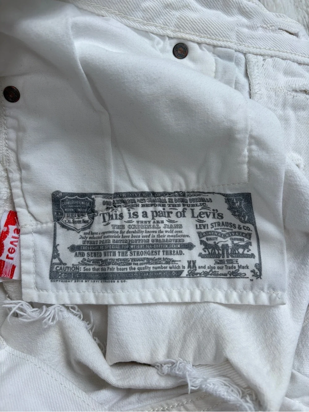Levi's White Distressed Denim Cutoff Shorts